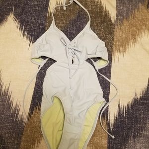 baby blue, open-back one-piece w/ side cuts